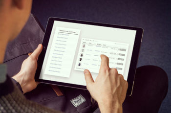 Person using WooCommerce Product Table on iPad